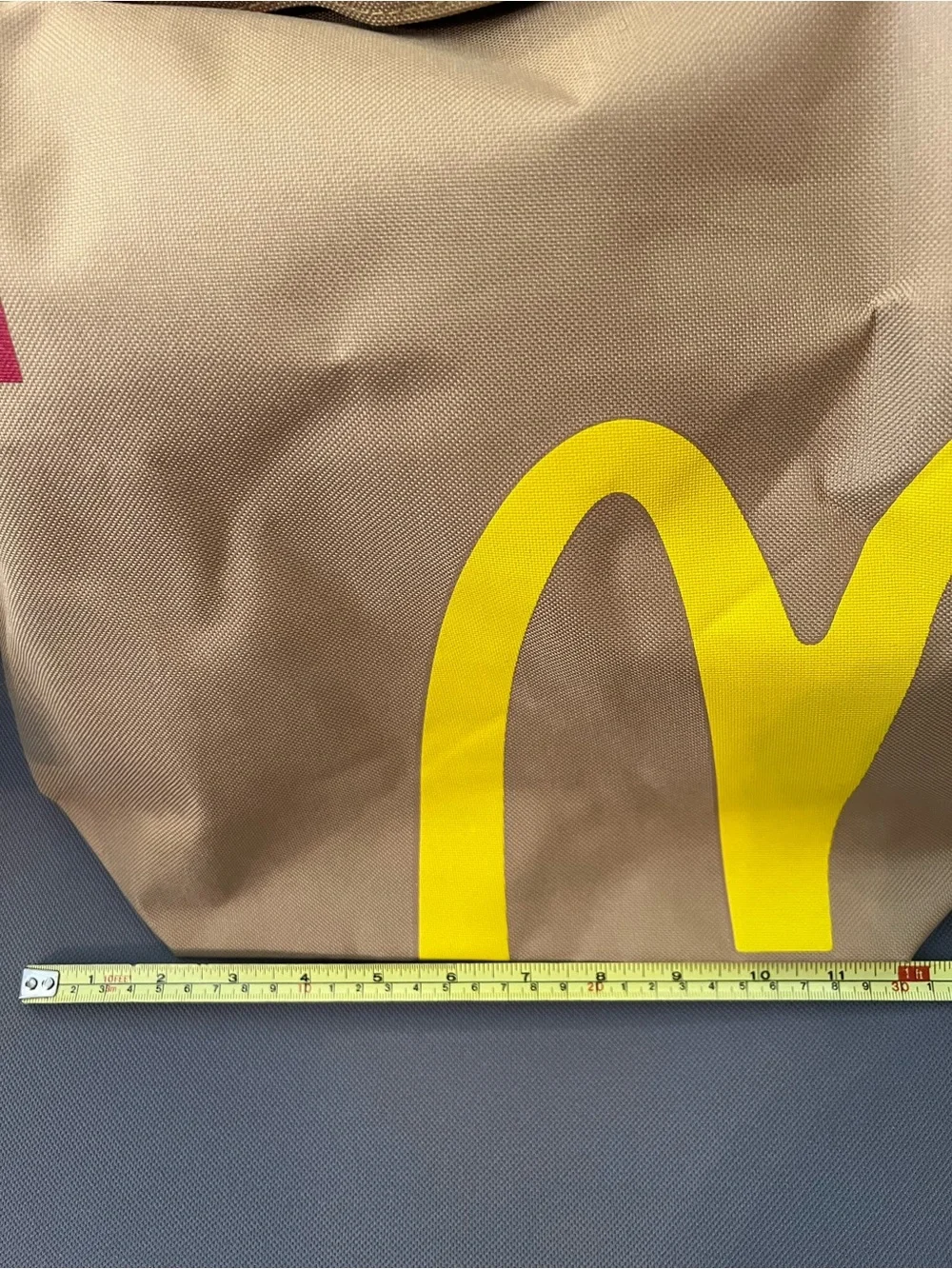 McDonald's Brown and Yellow Roll-Top backpack .